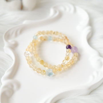 Radiance & Serenity – Golden Rutilated Quartz, Aquamarine & Amethyst Bracelet