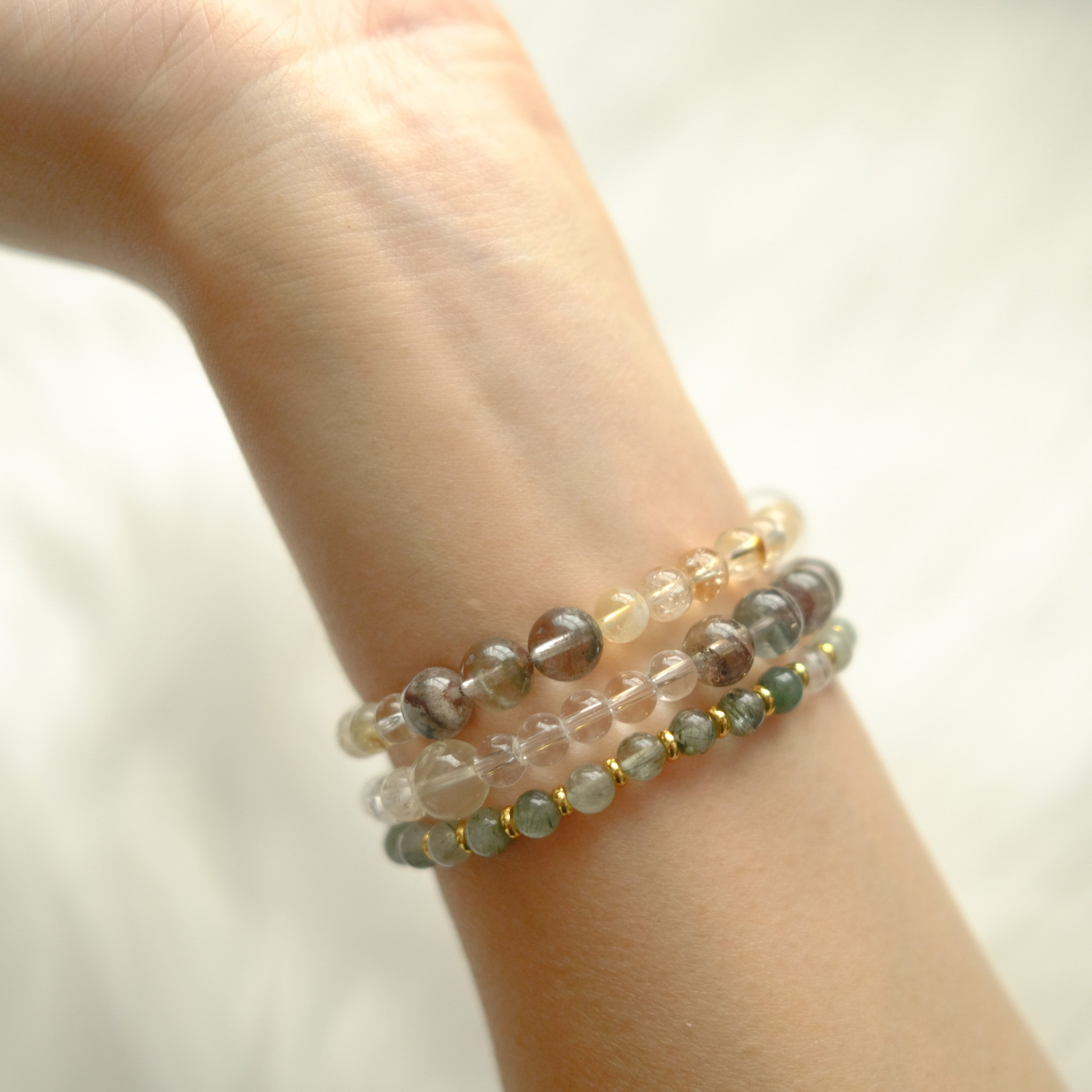 Abundance & Clarity – Golden Rutilated Quartz, Green Phantom & Clear Quartz Bracelet