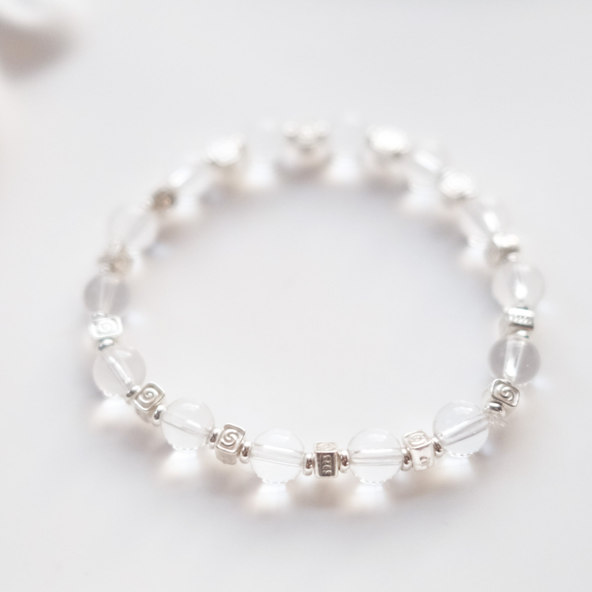 Spiral Flow – Clear Quartz Silver Bracelet | the Spiral Collection