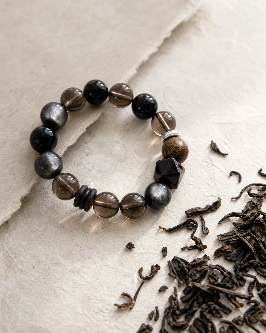 Aged Liu Bao tea leaves and ritual setting